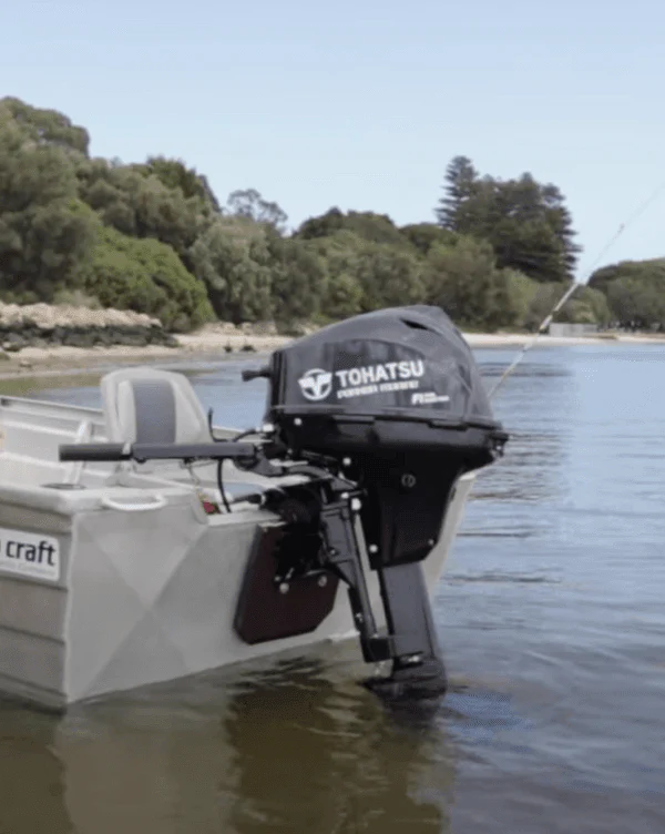 tohatsu outboard motor mounted on a small fishing boat